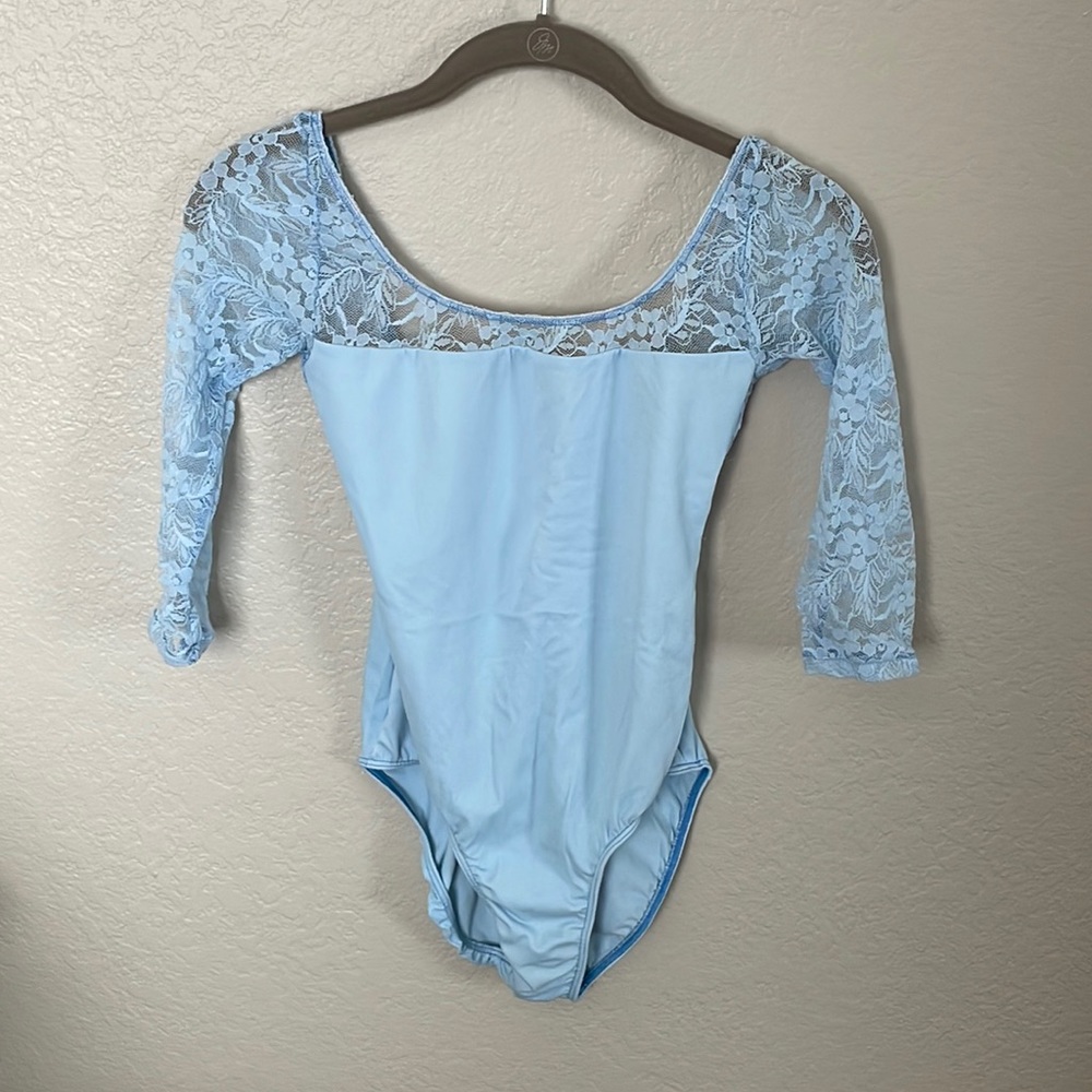 CLASS- IN LIGHT BLUE LEOTARD